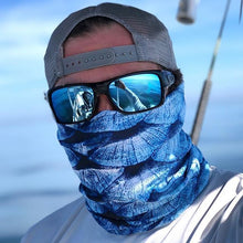 man taking selfie wearing blue scales neck gaiter mask free sunshields sunglasses 